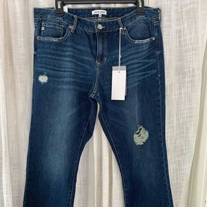 Straight Leg jeans with distressing at the bottom